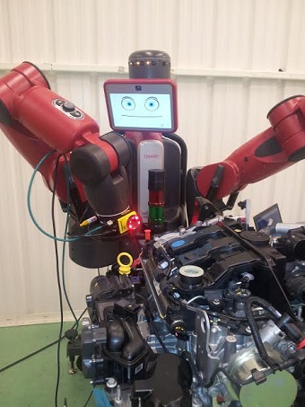 baxter robot with a Cognex In-Sight camera mounted on its arm